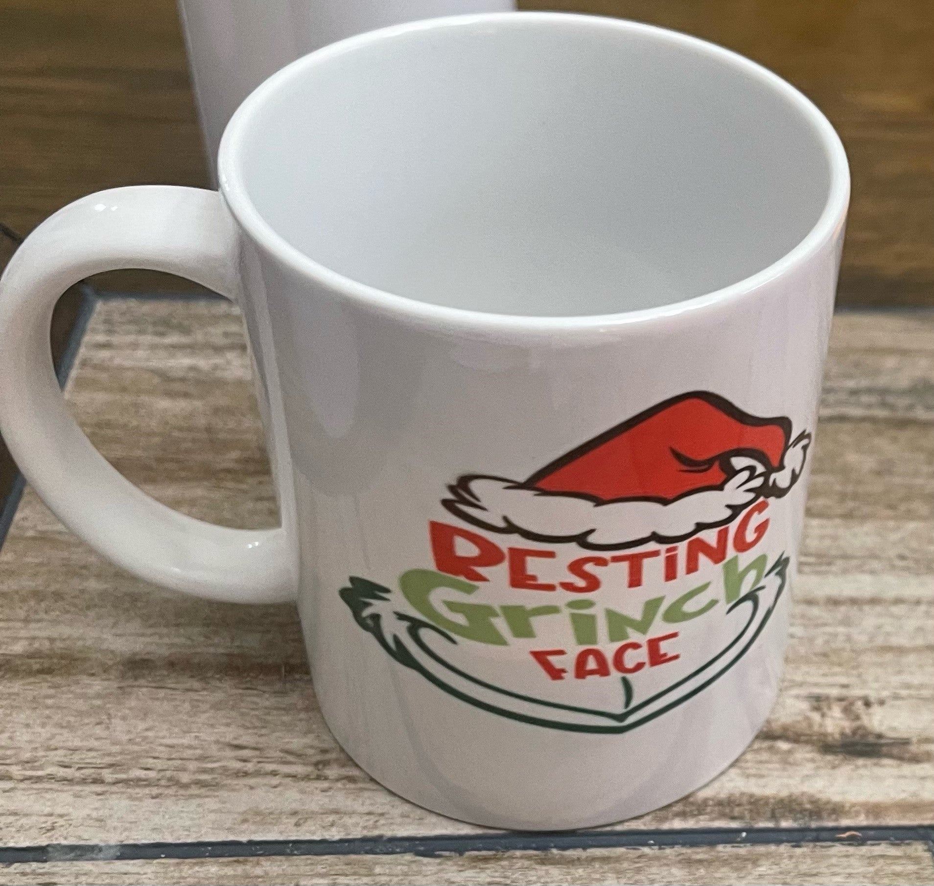 https://justplainfabulous.com/cdn/shop/products/coffeemug-RestingGrinchFace.jpg?v=1669432553&width=1908